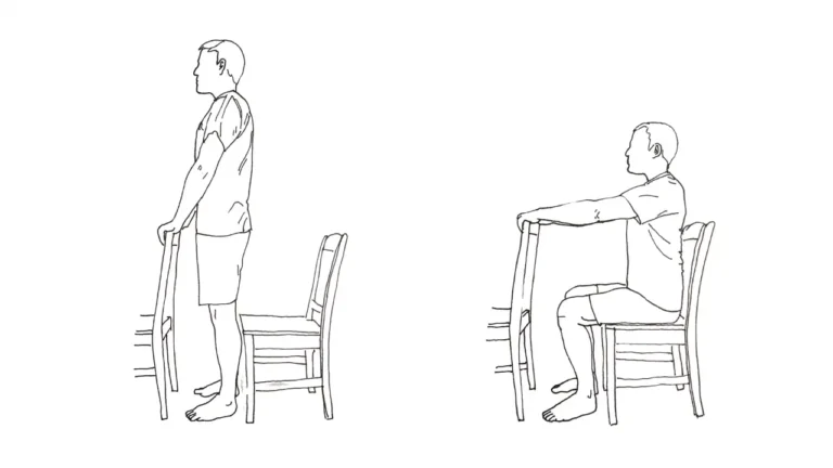 Man exercising the assisted sti to stand squat.