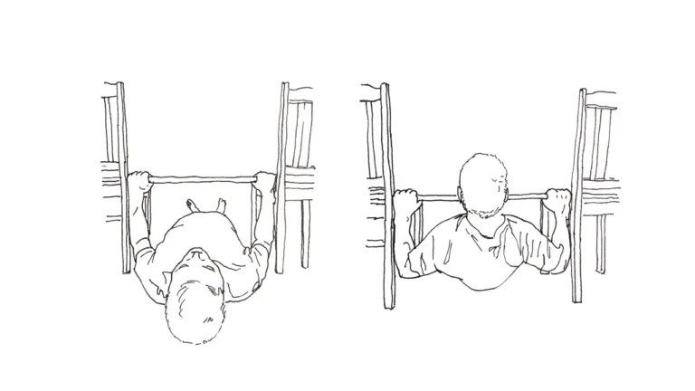 Man training seated pull chair hold.