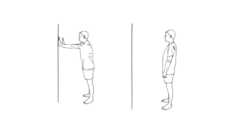 A man exercising wall lean hold.
