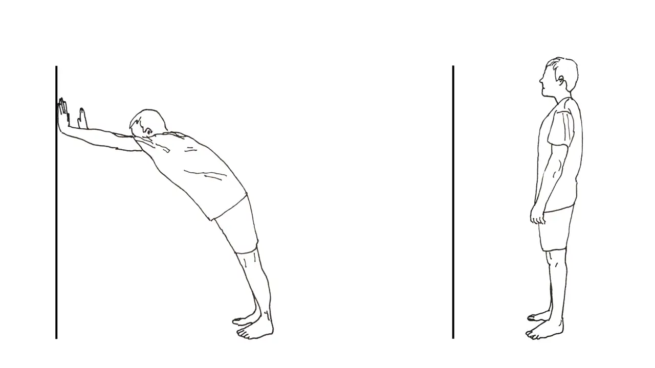 Man training wall lean shoulder hold.